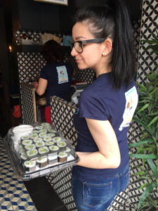 Anca takes the first lot of sushi to hungry festival goers